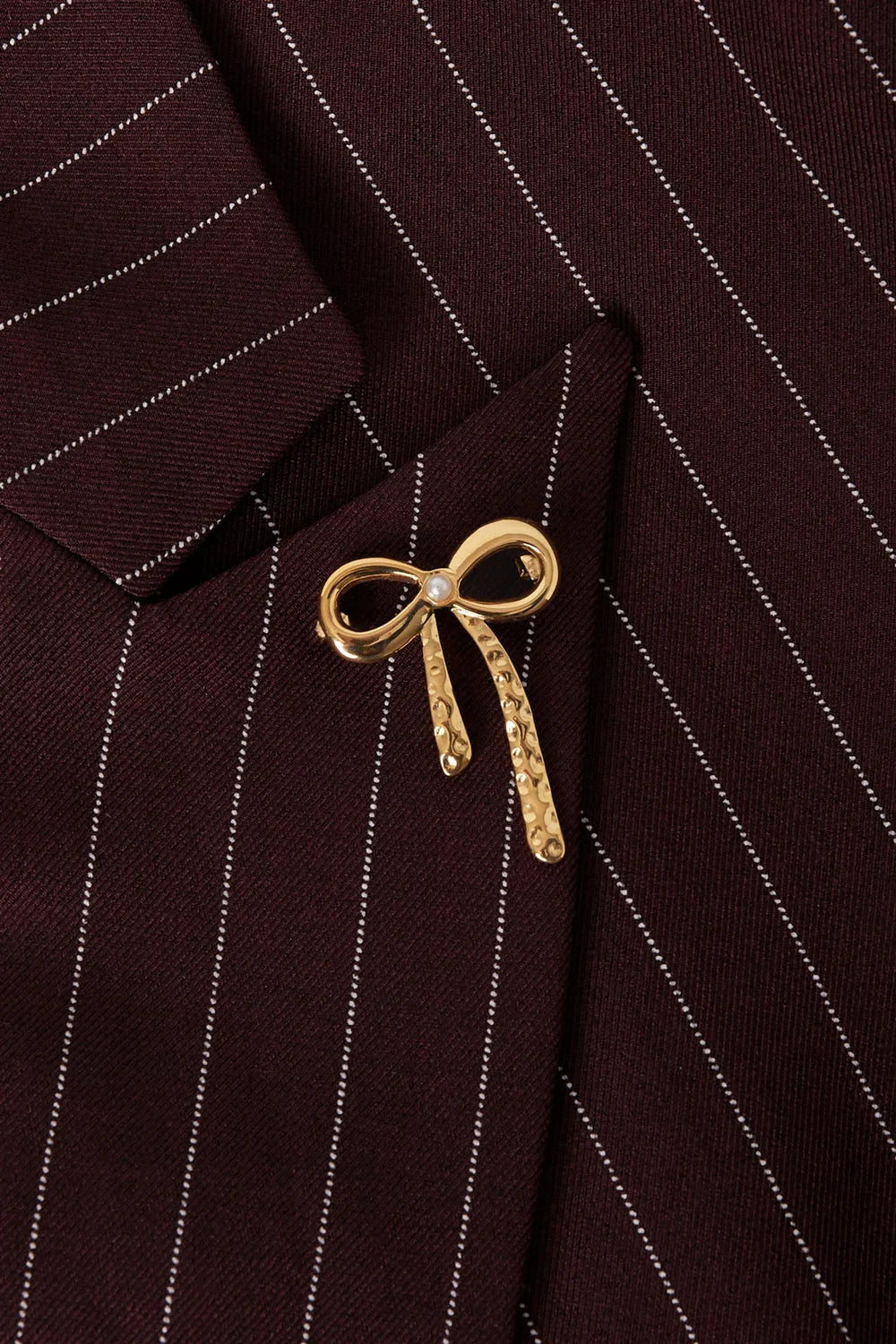 Bow-broche